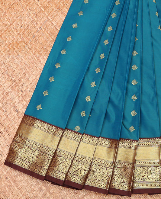 Blue Budget Silk Saree, Detailed with Zari Buttas on Its Body, Complemented by a Contrast Traditional Zari Design Border, Pallu Steeped with Flower Buttas, and Paired with a Contrast Blouse