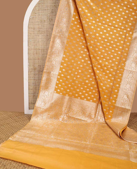 Orange floral buttas semi banaras nylon saree with self intricate zari design border & floral design pallu