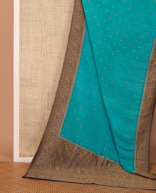 Blue zari buttas fancy crepe saree, contrast paisley design border & pallu steeped with paisleys