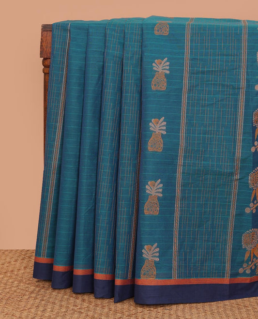 Blue stripes, and floral pot motifs Kanchi cotton saree, contrast plain border, and pallu of floral motifs, and geometric patterns