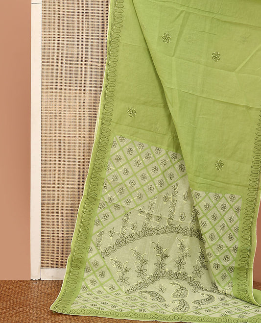 Green flowers thread embroidered Lucknowi chikankari saree, ogee patterned border, and floral embroidered pallu