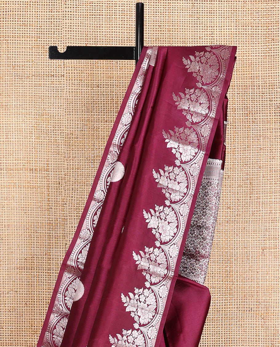 Maroon round-shaped zari buttas raw mango silk saree, zari border of scallop & floral designs & floral steeped pallu