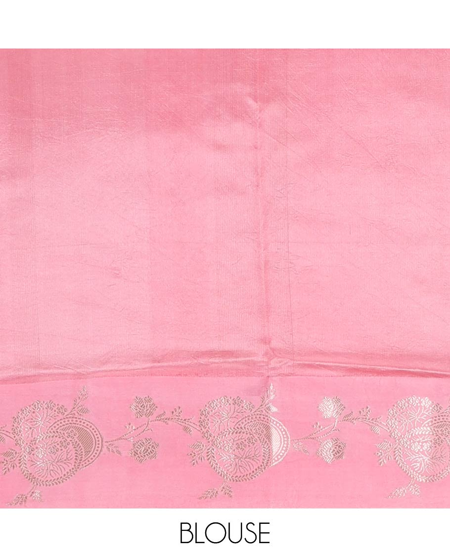 Green floral buttas raw mango silk saree, floral design border, and pallu adorned with floral, and geometric zari designs