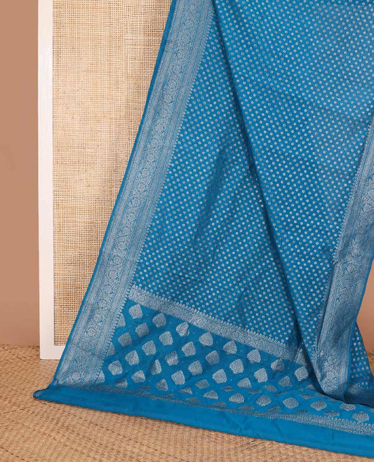 Blue zari buttas fancy saree, zari floral creeper border, and pallu steeped with intricate buttas