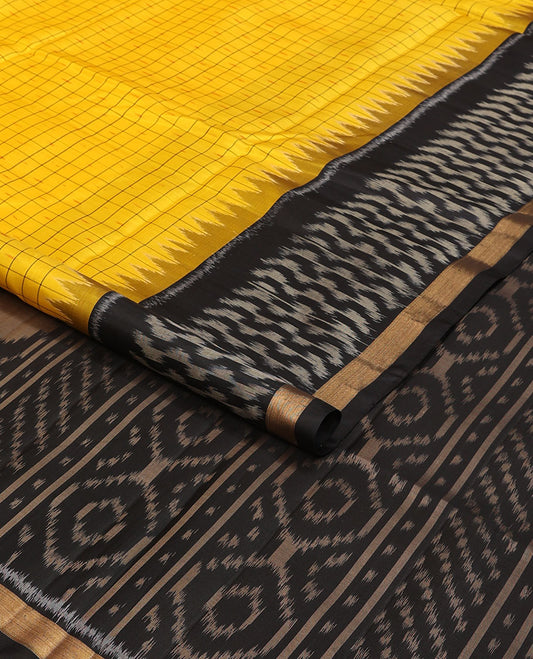 Yellow butta & checked pure ikkat saree, contrast temple ikkat black border & pallu of geometric patterns