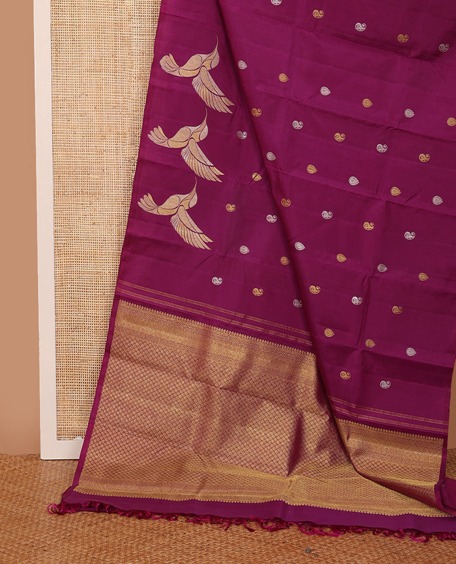 Borderless purple zari buttas Kanchipuram silk saree, self-pallu of thilakam mokku, muthu, leaf vine, and jaal designs