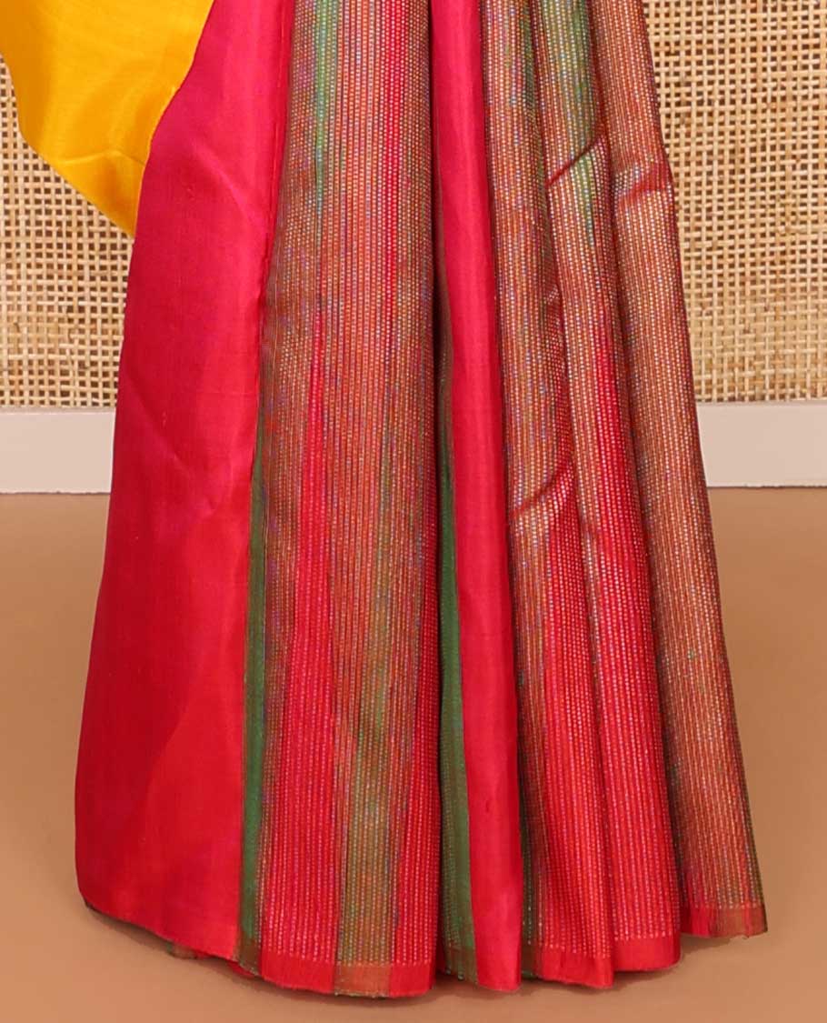 Borderless orange buttas kancheepuram silk saree with argyle design pallu