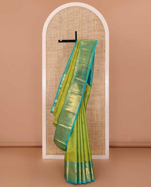 Leaf green zari buttas checked Kanchipuram silk saree, contrast border of ara bogudi,chakram and kuyil kann and jaal pallu