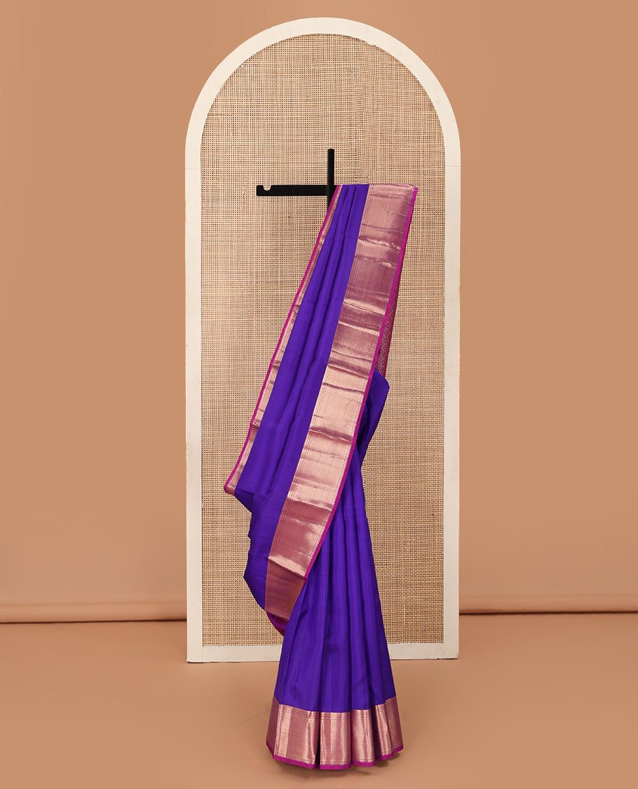 Violet plain Kanchipuram silk saree, contrast border of thilakam, banaras, kuyil kann, and rudraksham designs, and jaal pallu