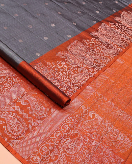 Grey zari buttas soft silk saree, contrast border of paisleys and chakram designs, and pallu of intricate designs