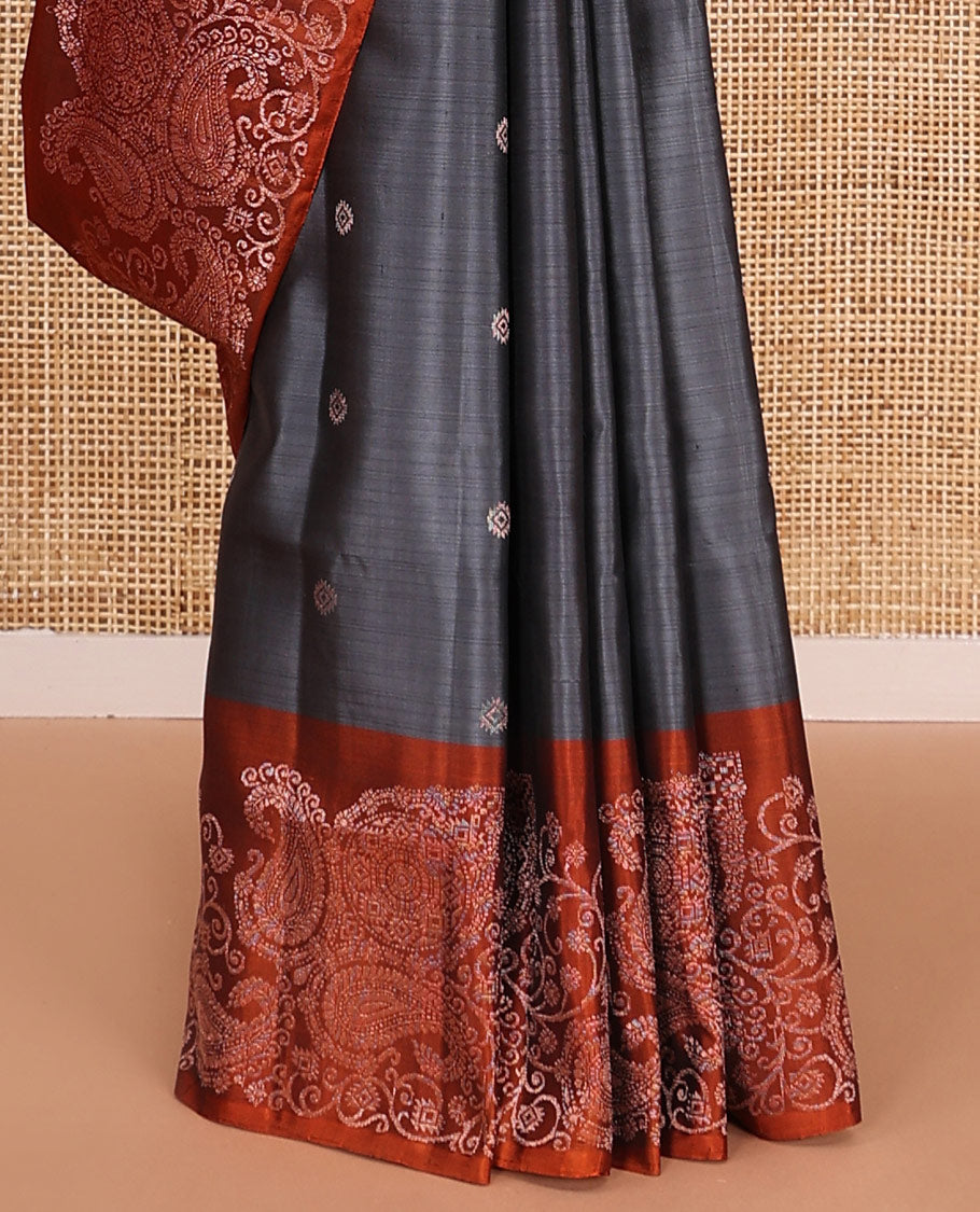 Grey zari buttas soft silk saree, contrast border of paisleys and chakram designs, and pallu of intricate designs