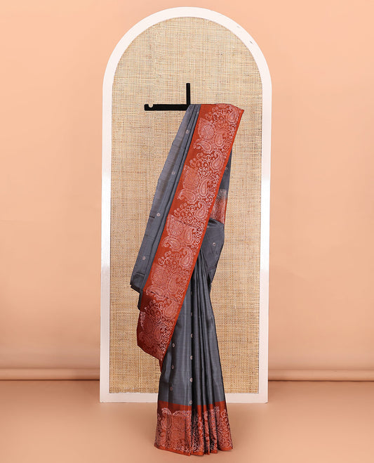 Grey zari buttas soft silk saree, contrast border of paisleys and chakram designs, and pallu of intricate designs