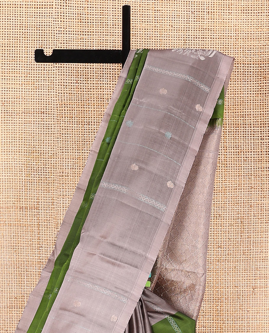 Green zari buttas and neli stripes soft silk saree, contrast zari buttas and neli striped border, and  jaal pallu
