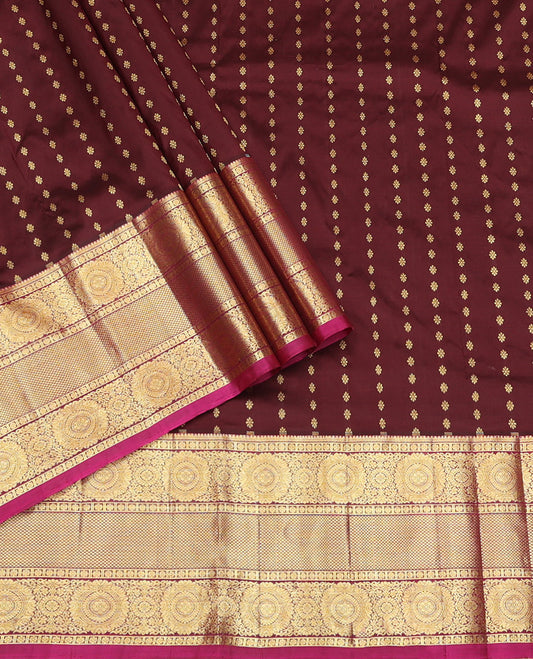 Brown Pure Silk Pavadai Material, Embellished with Zari Buttas on Its Skirt, a Contrast Traditional Zari Border, and a Contrast Blouse