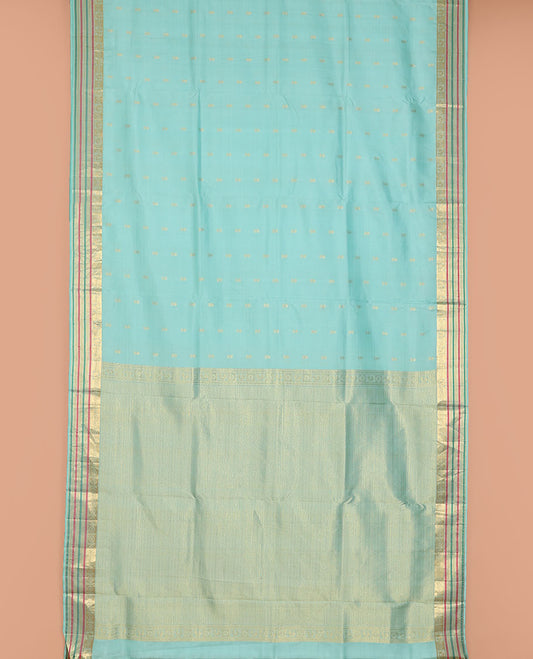 Blue nine-yard silksaree with zari buttas,zari border of rekku,mayil chakram,mayil kann,banaras & neli & intricate pallu