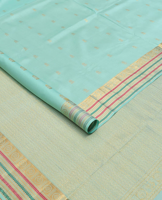 Blue nine-yard silksaree with zari buttas,zari border of rekku,mayil chakram,mayil kann,banaras & neli & intricate pallu