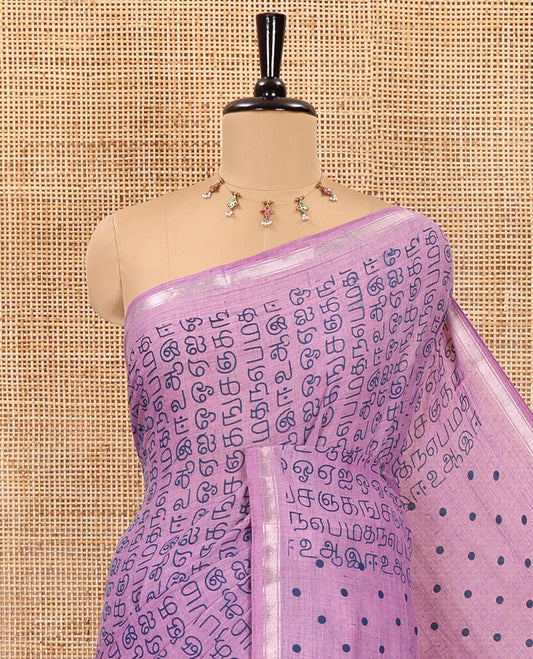 Lavender tamil letters printed soft cotton saree, zari piping border, small polka dotted pallu, and blouse of abstract and polka dots print
