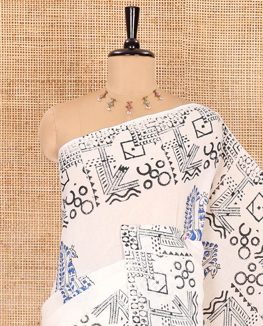 White peacock block printed mul cotton saree, geometric printed border, geometric printed pallu, and a matching block printed blouse