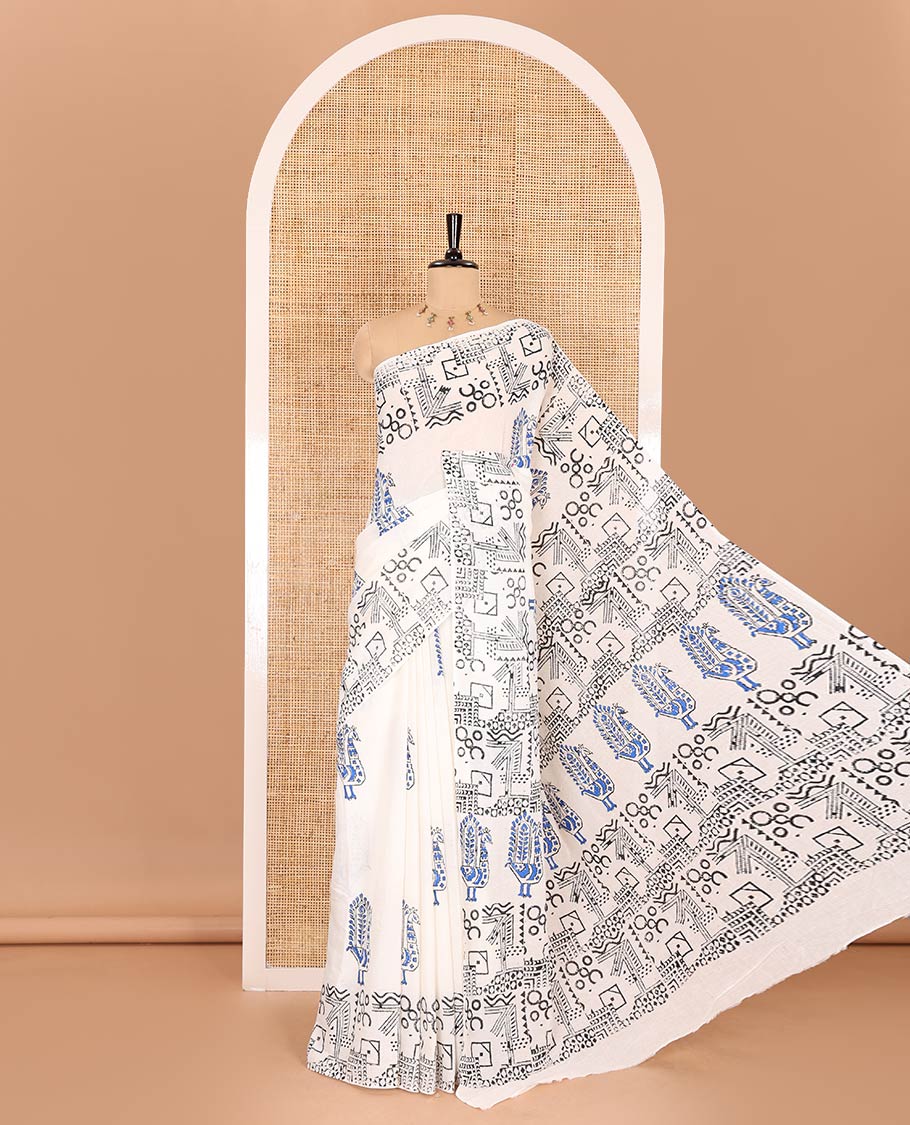 White peacock block printed mul cotton saree, geometric printed border, geometric printed pallu, and a matching block printed blouse