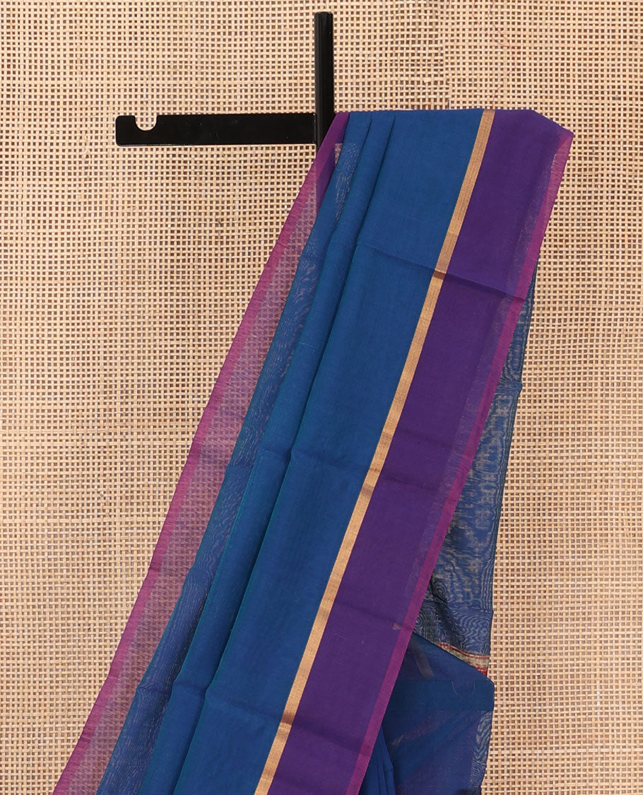 Royal blue plain silk cotton saree, contrast zari striped border, and contrast plain pallu