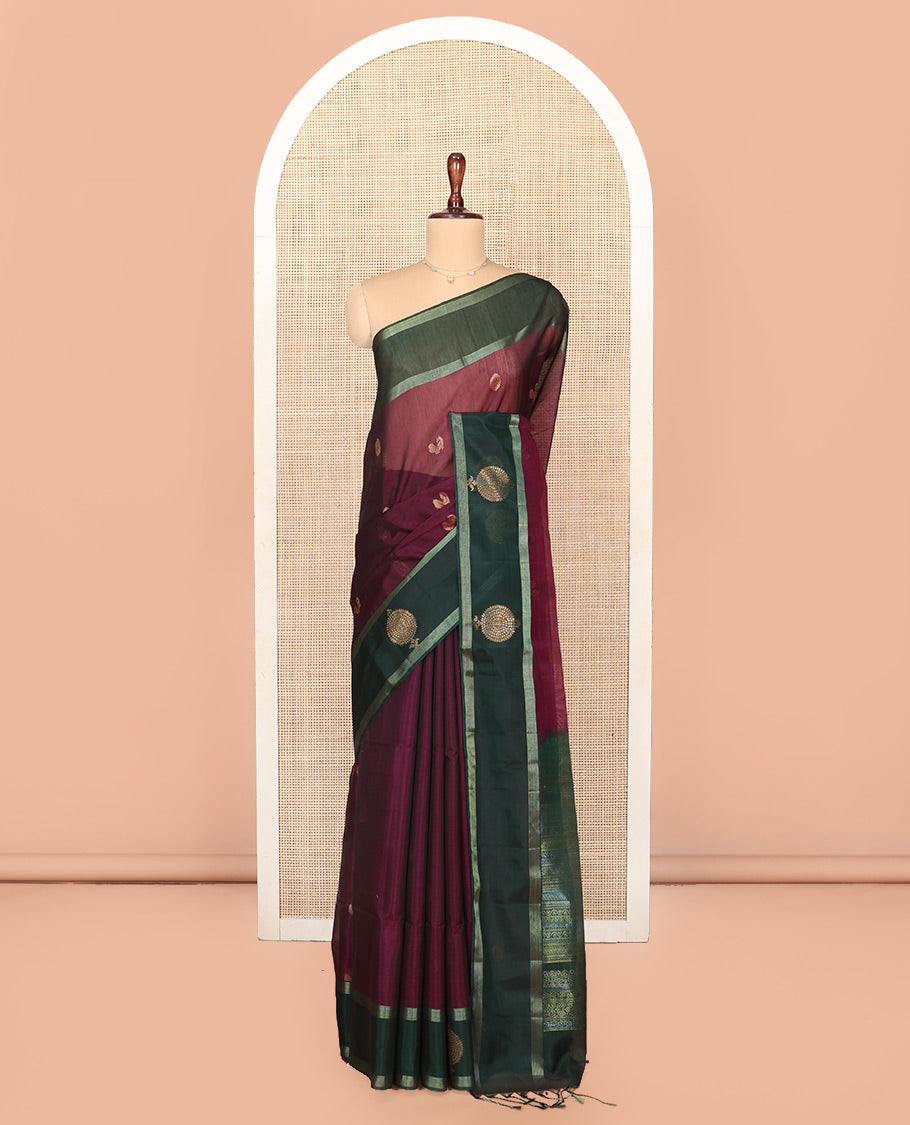 Maroon Silk Cotton Saree, Artfully Woven with Peacock and Rudraksham Motifs On Its Body, Complemented by Contrast Zari Motifs Woven Border, Geometric Zari Patterned Pallu and Paired with a Contrast Blouse