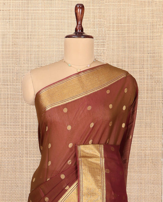 Brown Silk Cotton Saree, Accentuated with Zari Buttas All Over Its Body, Highlighted by Traditional Zari Border, Diagonally Woven Pallu and Paired With a Contrast Blouse