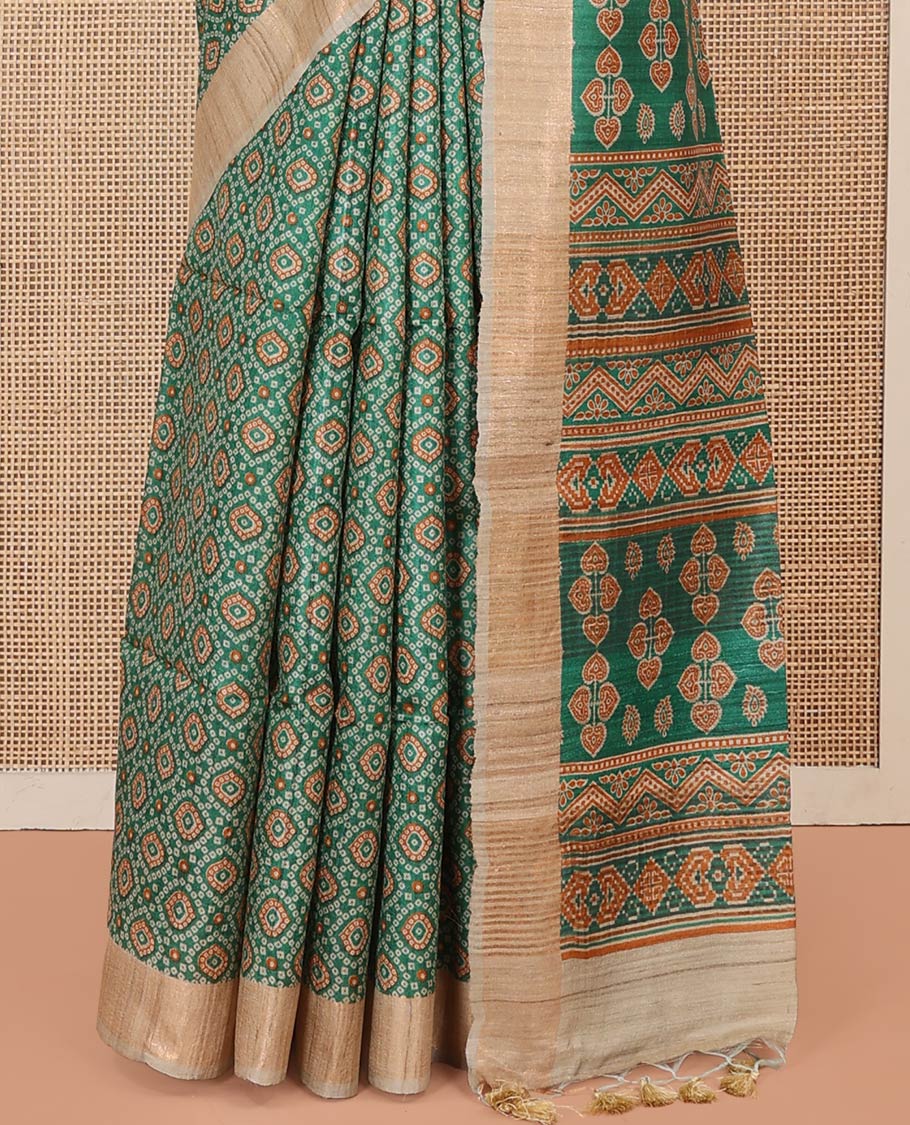 Green Tussar Silk Saree Beautified with Bandhani Dots Printed All Over Its Body, Complemented by Contrast Border, Pallu of Intricate Print, and Paired with a Contrast Blouse