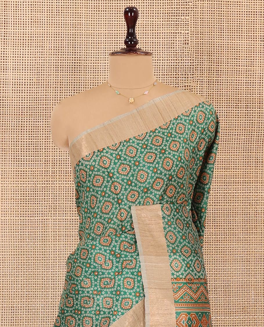 Green Tussar Silk Saree Beautified with Bandhani Dots Printed All Over Its Body, Complemented by Contrast Border, Pallu of Intricate Print, and Paired with a Contrast Blouse