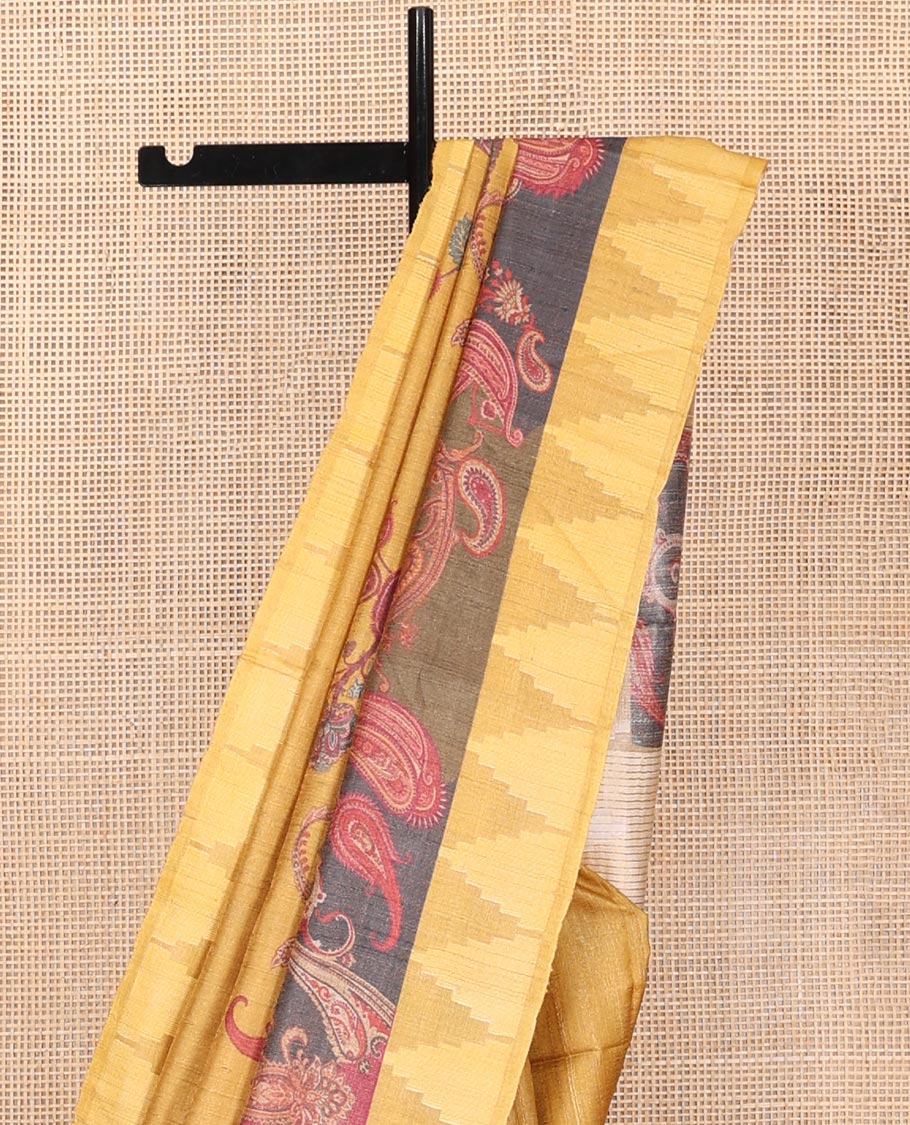 Yellow Tussar Silk Saree, Meticulously Crafted with Paisley Print, Complemented by Contrast Temple Border, Striped Pallu, and a Matching Blouse