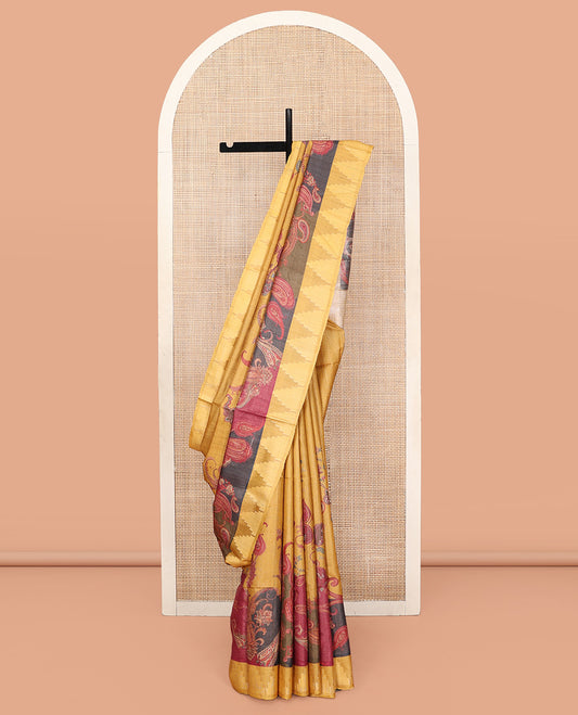 Yellow Tussar Silk Saree, Meticulously Crafted with Paisley Print, Complemented by Contrast Temple Border, Striped Pallu, and a Matching Blouse