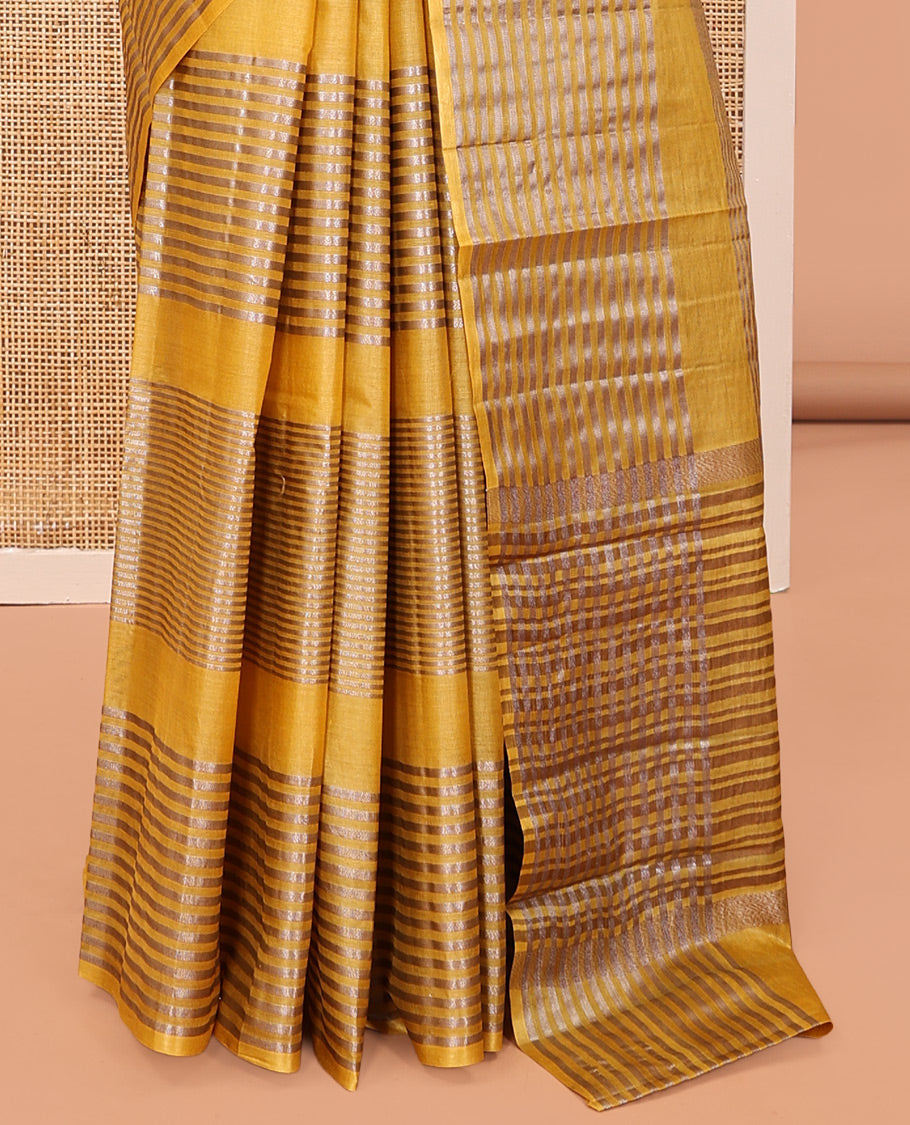 Borderless Mustard Tussar Silk Saree, Detailed with Zari Stripes, Striped Pallu, and a Matching Blouse
