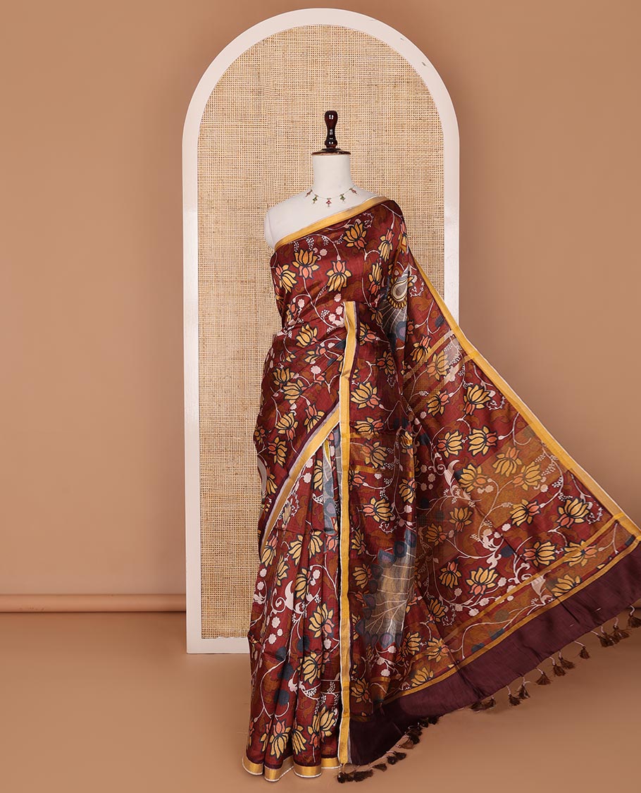 Maroon Pichwai lotus vine digital printed banana pith saree, contrast plain piping border, and lotus vine printed pallu