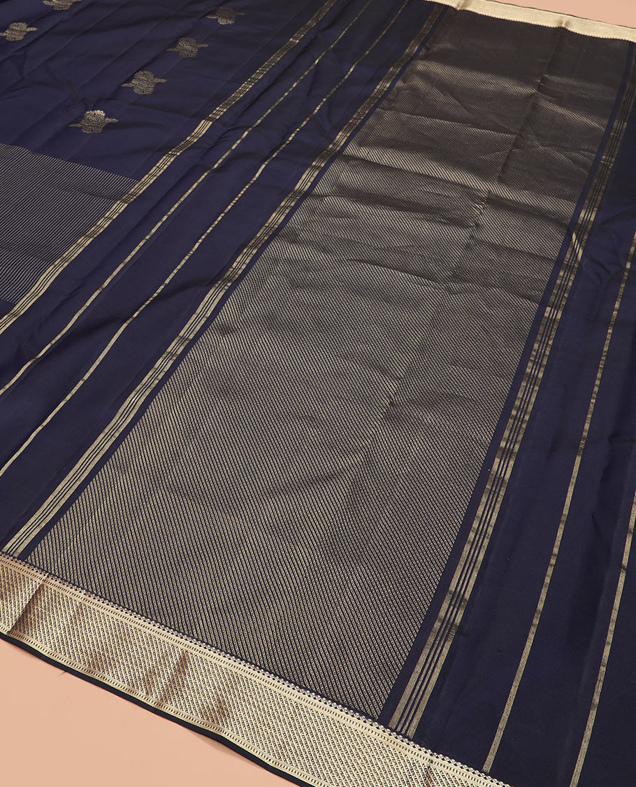 Navy blue zari design silk saree, zari border of salngai and muthu designs, and zari design pallu