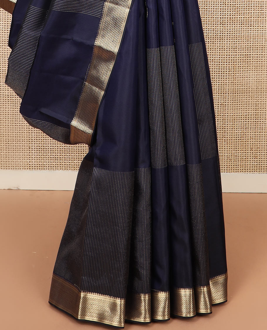 Navy blue zari design silk saree, zari border of salngai and muthu designs, and zari design pallu