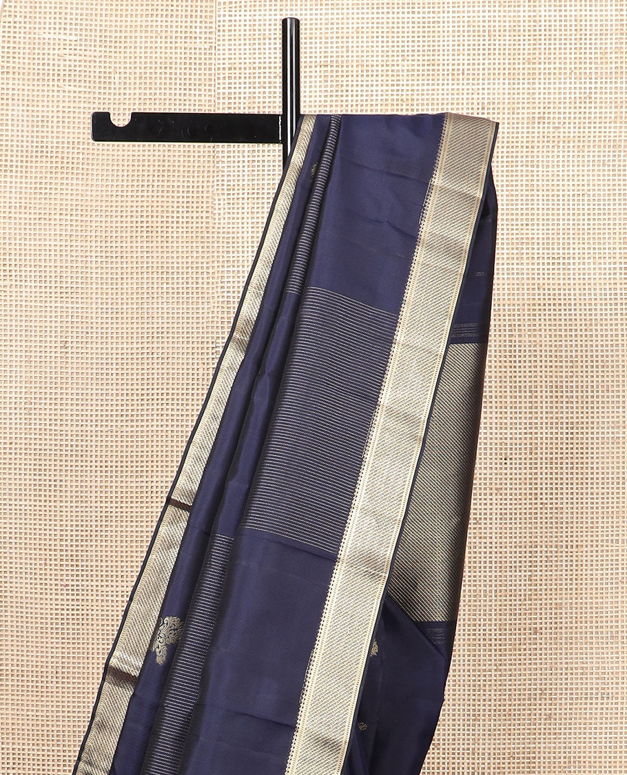 Navy blue zari design silk saree, zari border of salngai and muthu designs, and zari design pallu