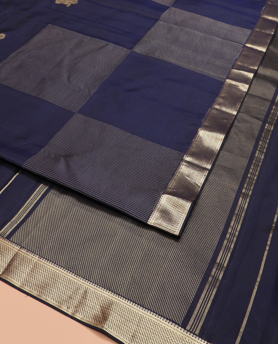 Navy blue zari design silk saree, zari border of salngai and muthu designs, and zari design pallu
