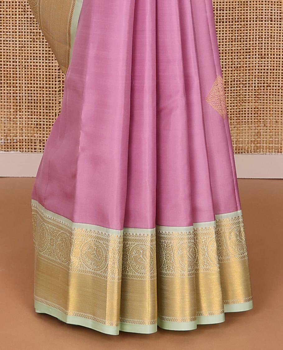 Pink zari buttas silksaree, contrast border of kathir, floral & round mayil designs & zari-rich jaal pallu