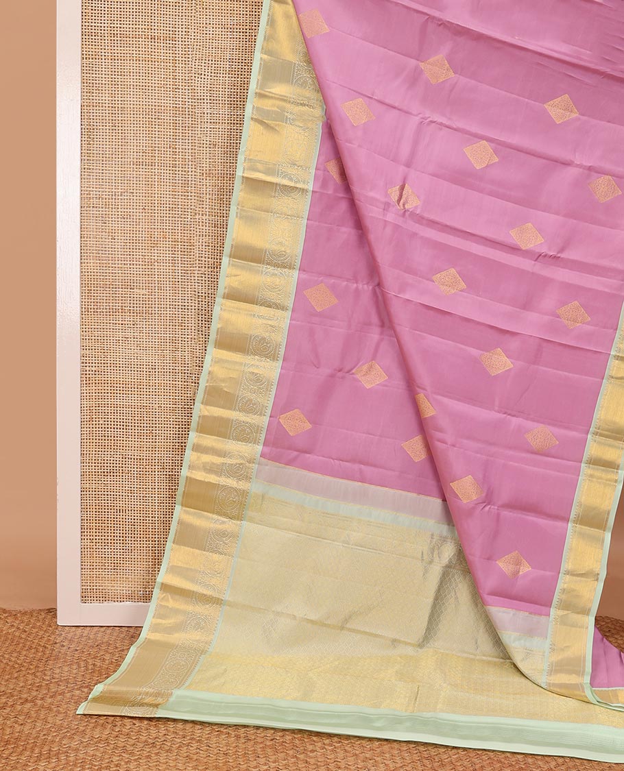 Pink zari buttas silksaree, contrast border of kathir, floral & round mayil designs & zari-rich jaal pallu