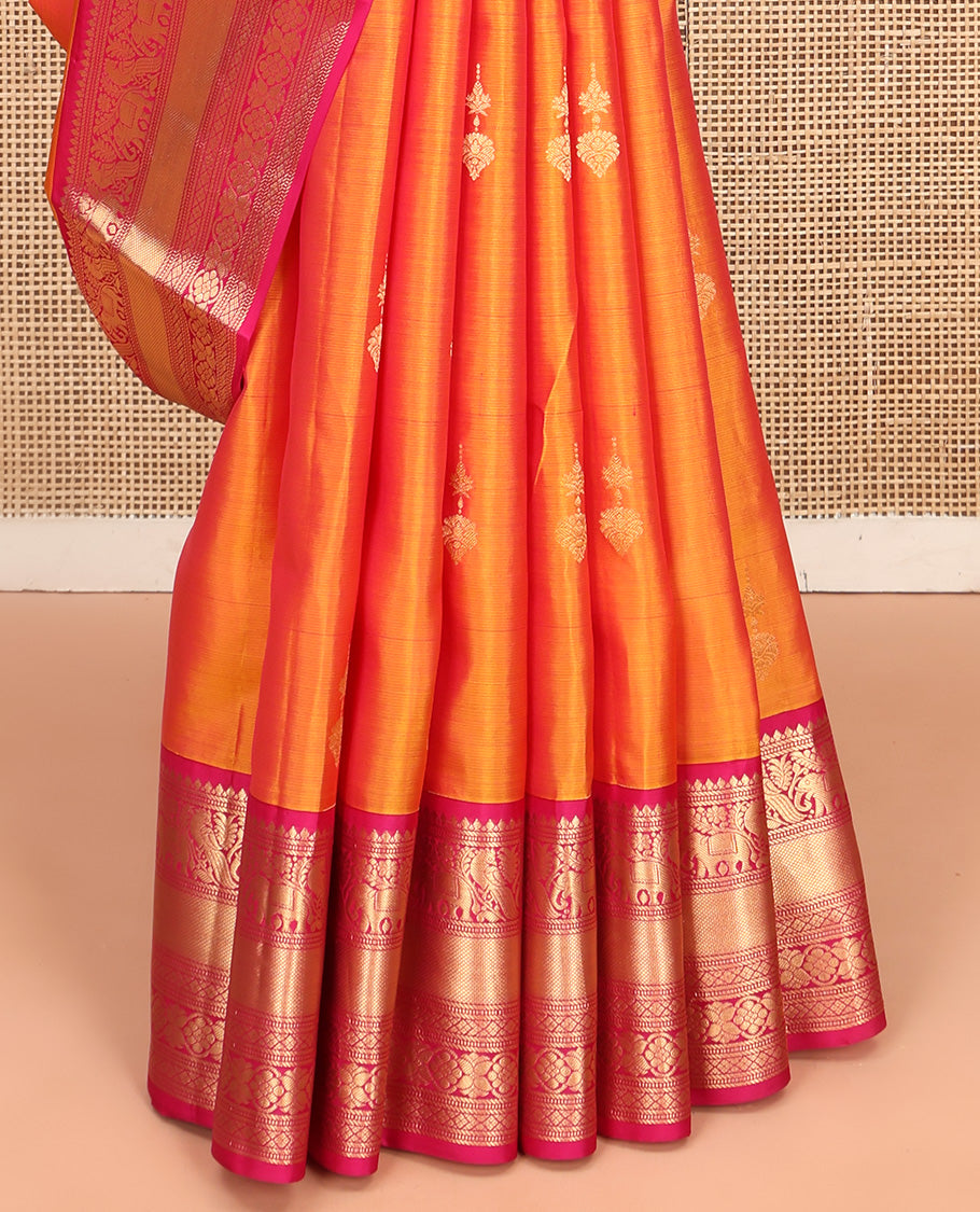 Orange Vasundhara Silk Saree, Entralled with Zari Buttas All Over Its Body, Complemented by Contrast Border of Mayil, Yaanai, Diamond and Floral Designs Grand Jaal Pallu and Paired with a Contrast