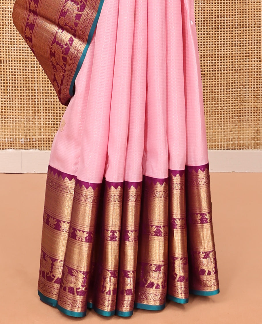 Pink Vasundhara Silk Saree, Gleamed Up with Pichwai Cow and Lotus Buttas, a Contrast Border of Rekku, Mayil Kann, Vanki, Lotus, and Cow Designs, Grand Pallu, and a Contrast Blouse