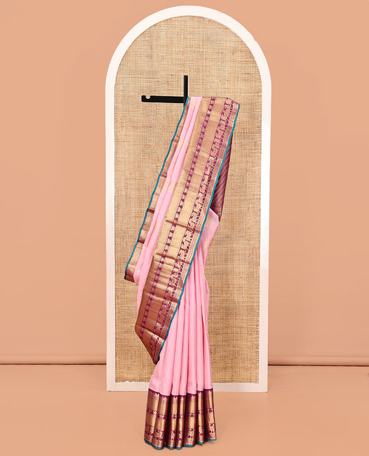 Pink Vasundhara Silk Saree, Gleamed Up with Pichwai Cow and Lotus Buttas, a Contrast Border of Rekku, Mayil Kann, Vanki, Lotus, and Cow Designs, Grand Pallu, and a Contrast Blouse