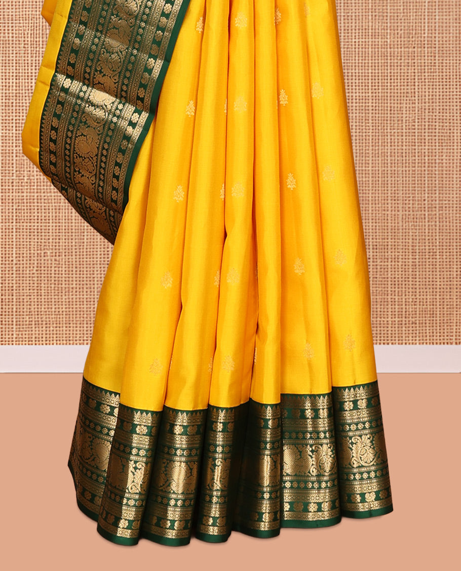 Yellow Vasundhara Silk Saree, Sparsely Woven with Zari Buttas, Contrast Border of Rekku, Kamalam, and Mayil Designs, Grand Pallu, and a Contrast Blouse