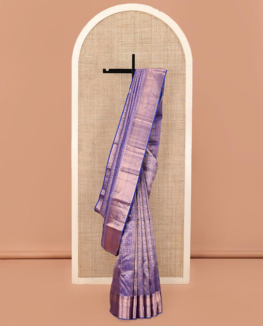 Blue Kanchipuram Wedding Silk Saree, Meticulously Crafted with Jacquard Designs on Its Body, Highlighted by a Zari Border of Muthu, Neli, Rudraksham, and Vanki Designs, Opulently Embellished Pallu, and Paired with a Matching Blouse