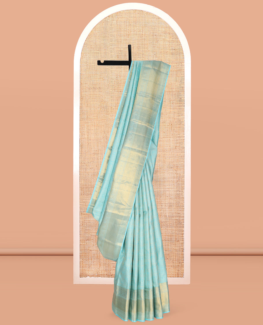 Pale Blue Jacquard Kanchipuram Wedding Silk Saree, Highlighted by a Zari Border of Thilakam Mokku, Arumbu Manga, and Mayil Kann Designs, Grand Jaal Pallu, and Matching Blouse