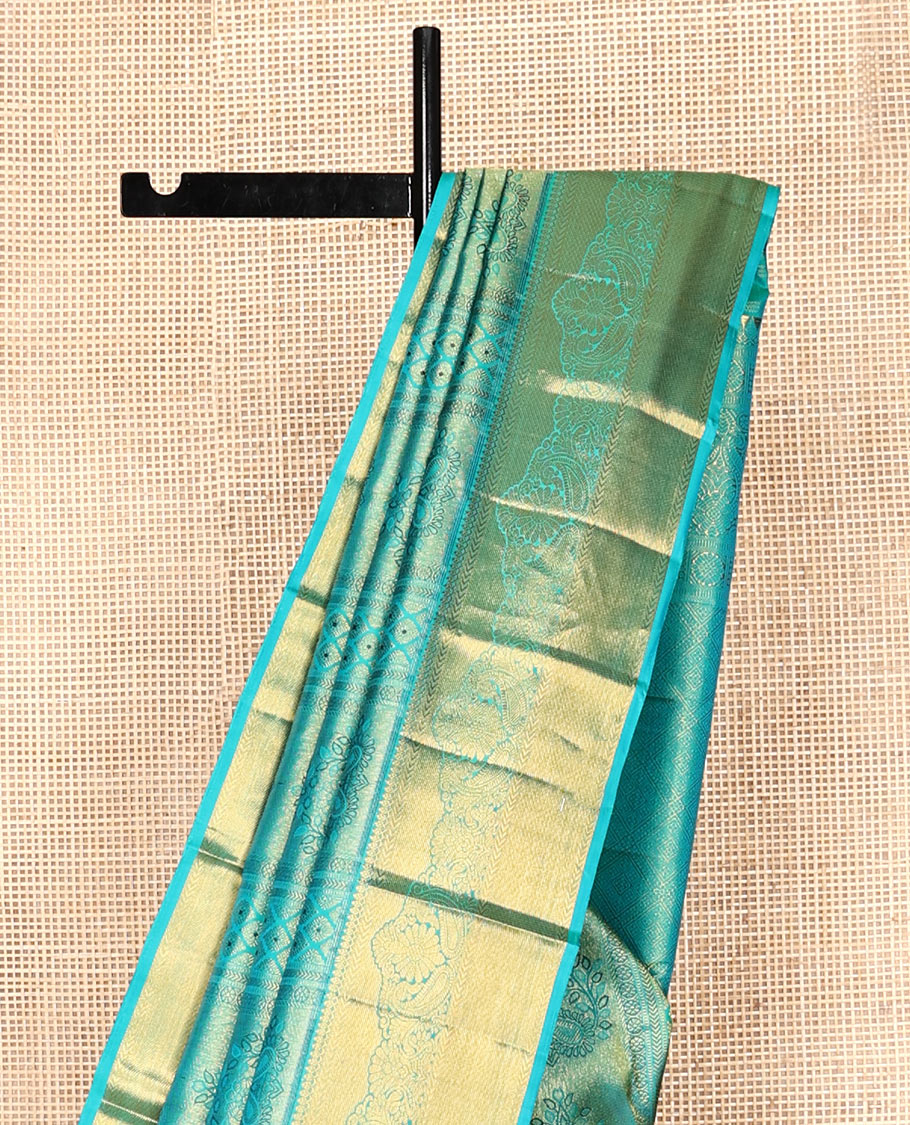 Blue Kanchipuram Wedding Silk Saree, Decked Up with Jacquard Design, Zari Border of Thilakam Mokku, and  Manga Designs, Grand Jaal Pallu, and a Matching Blouse