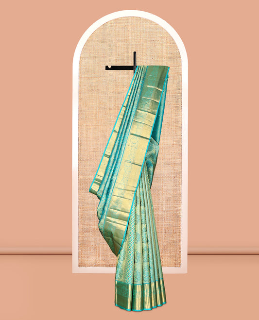 Blue Kanchipuram Wedding Silk Saree, Decked Up with Jacquard Design, Zari Border of Thilakam Mokku, and  Manga Designs, Grand Jaal Pallu, and a Matching Blouse