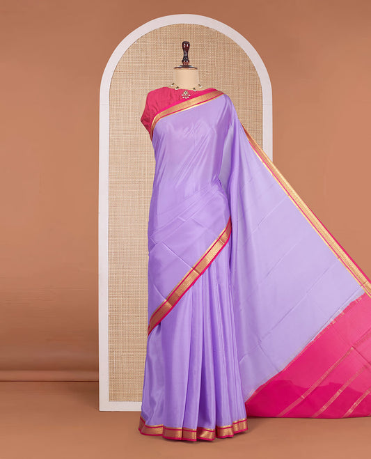 Lavender Plain Mysore Silk Saree, Complemented by a Contrast Traditional Zari Design Border, Zari Striped Pallu, and Paired with a Contrast Blouse