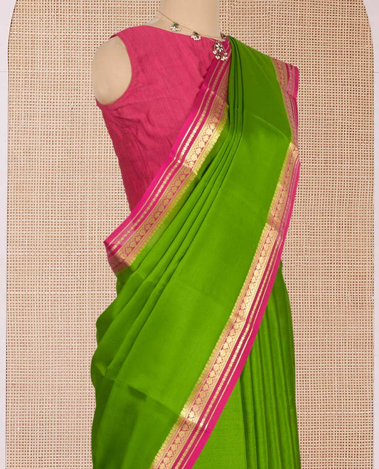 Parrot Green Plain Mysore Silk Saree, Complemented by a Contrast Traditional Zari Design Border, Zari-Striped Pallu, and Paired with a Contrast Blouse