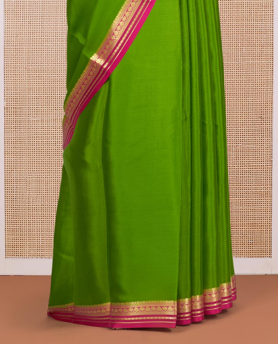 Parrot Green Plain Mysore Silk Saree, Complemented by a Contrast Traditional Zari Design Border, Zari-Striped Pallu, and Paired with a Contrast Blouse