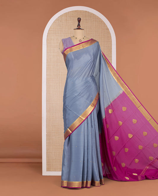 Grey Mysore Silk Saree, Subtly Sparkled with Zari Buttas All Over Its Body, Complemented by a Contrast Traditional Zari Design Border, Zari-Buttas Woven Pallu, and Paired with a Contrast Blouse
